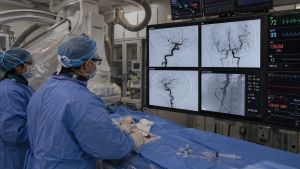 Interventional radiologist performing stroke thrombectomy