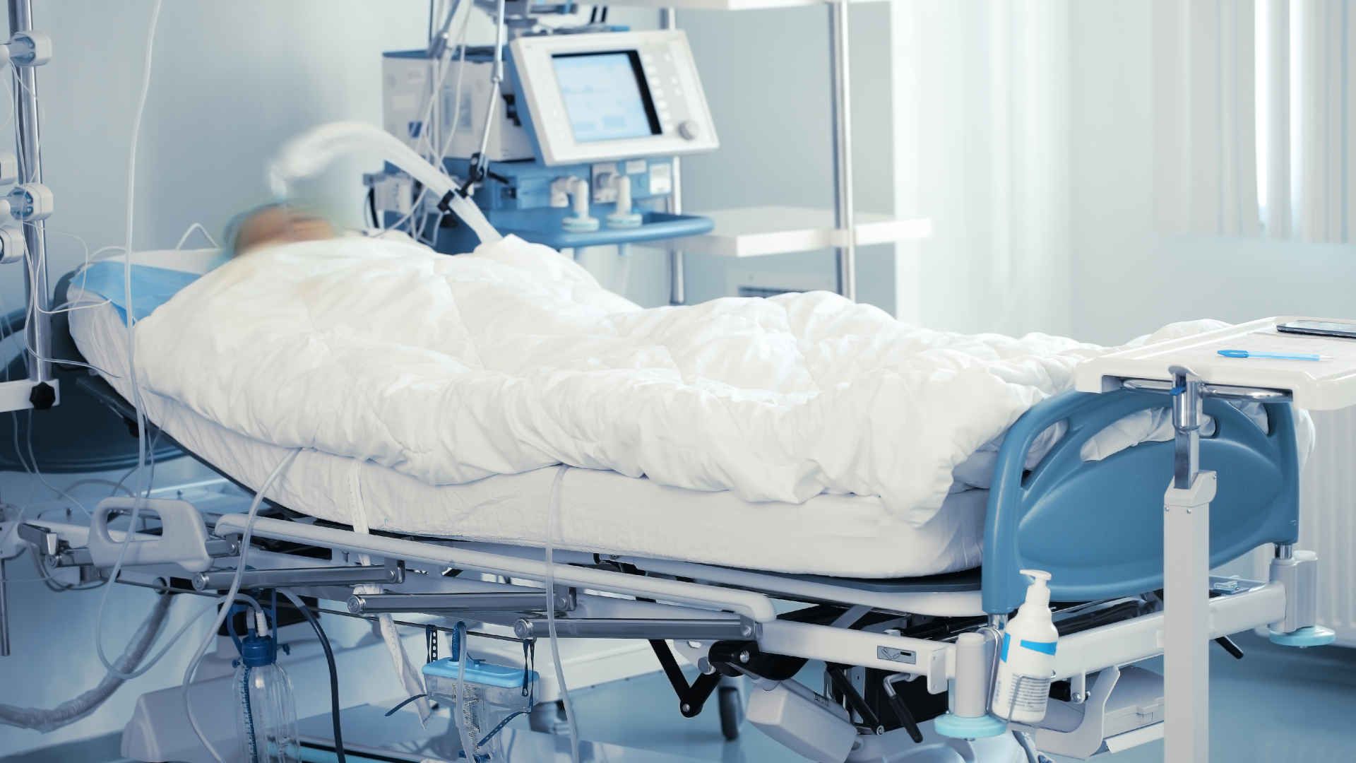 Ventilated patient in bed in the ICU